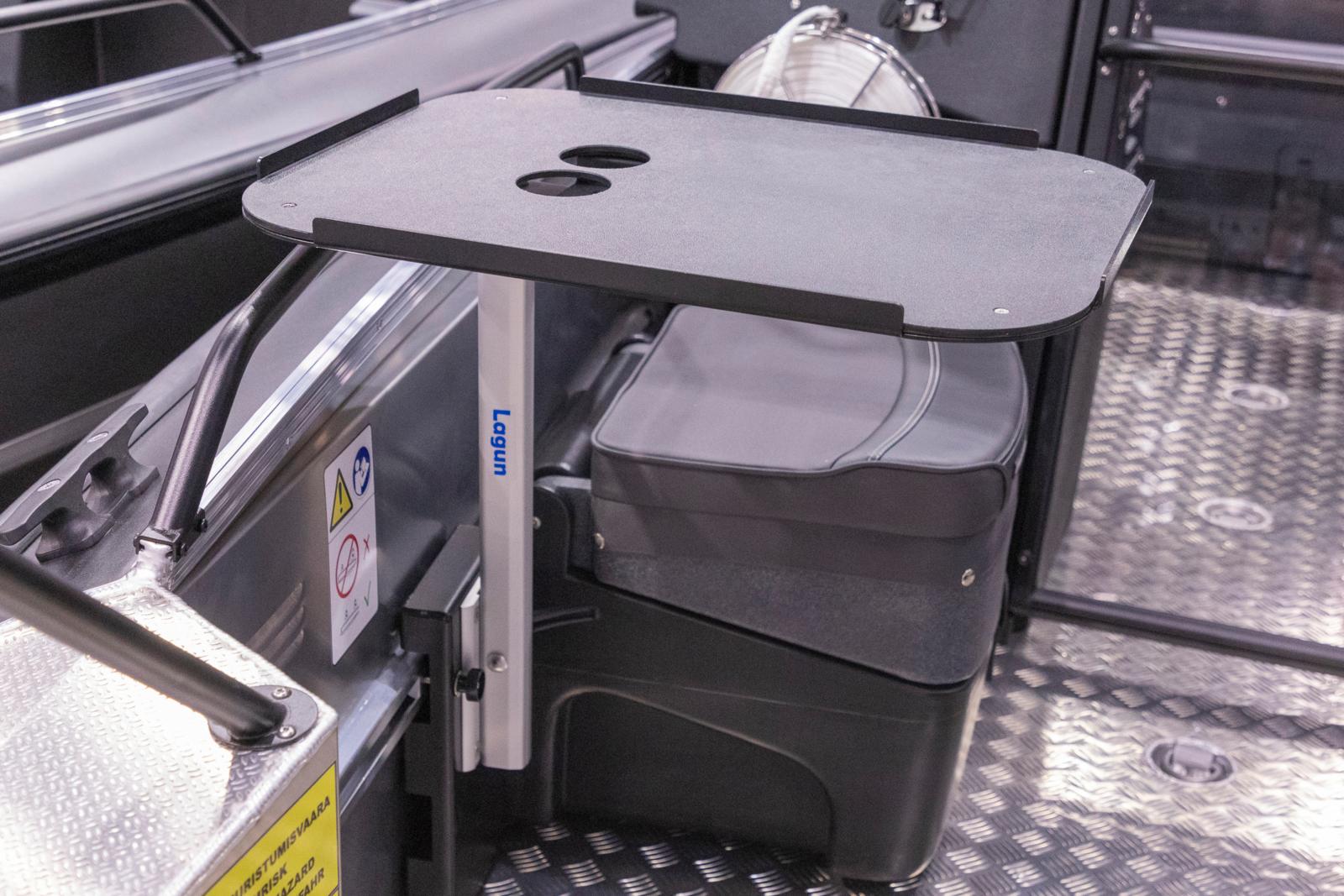 Table top with two cup holders. Mounted onto systemrail.