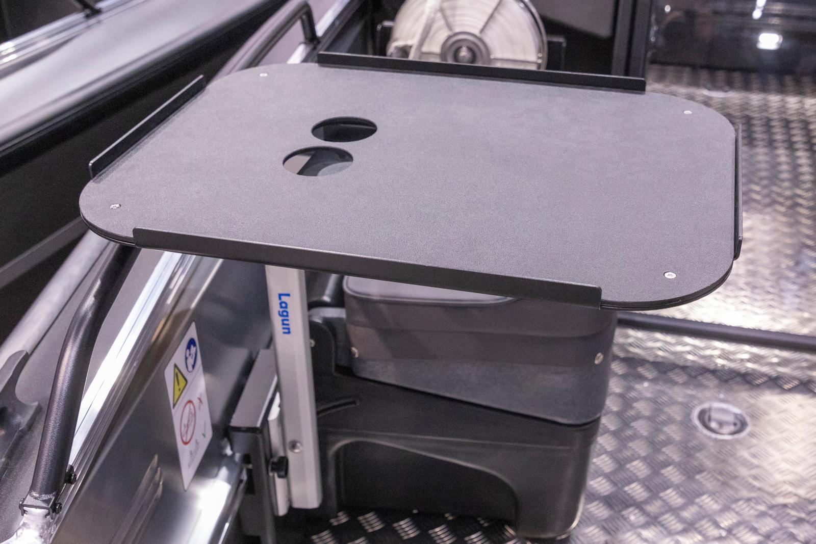 Table top with two cup holders. Mounted onto systemrail.