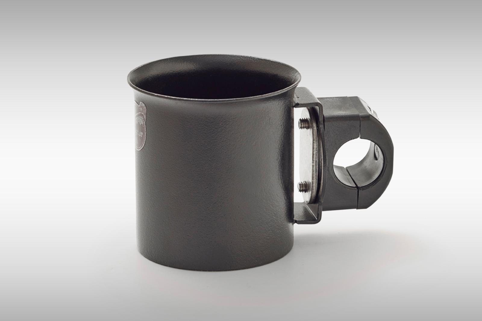 Kaiteeseen kiinnitettävä musta tölkkiteline.