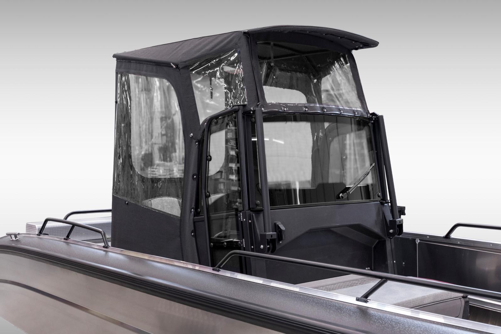 Faster 635CC -mallin t-top -katoksen takaosa. Hintaan kuuluu t-top takaseinä/ikkuna sekä sivuseinät, jotka kiinnitetään t-top-katokseen vetoketjuilla. Itse t-top -rakenne/katos ei sisälly hintaan.